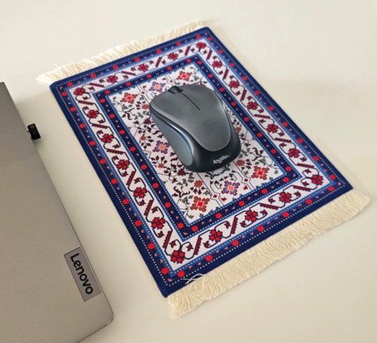 Muismat perzisch tapijt als kerstcadeautje voor personeel